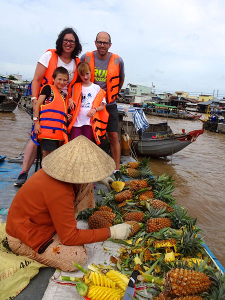 Au marché flottant dans le Delta du Mékong