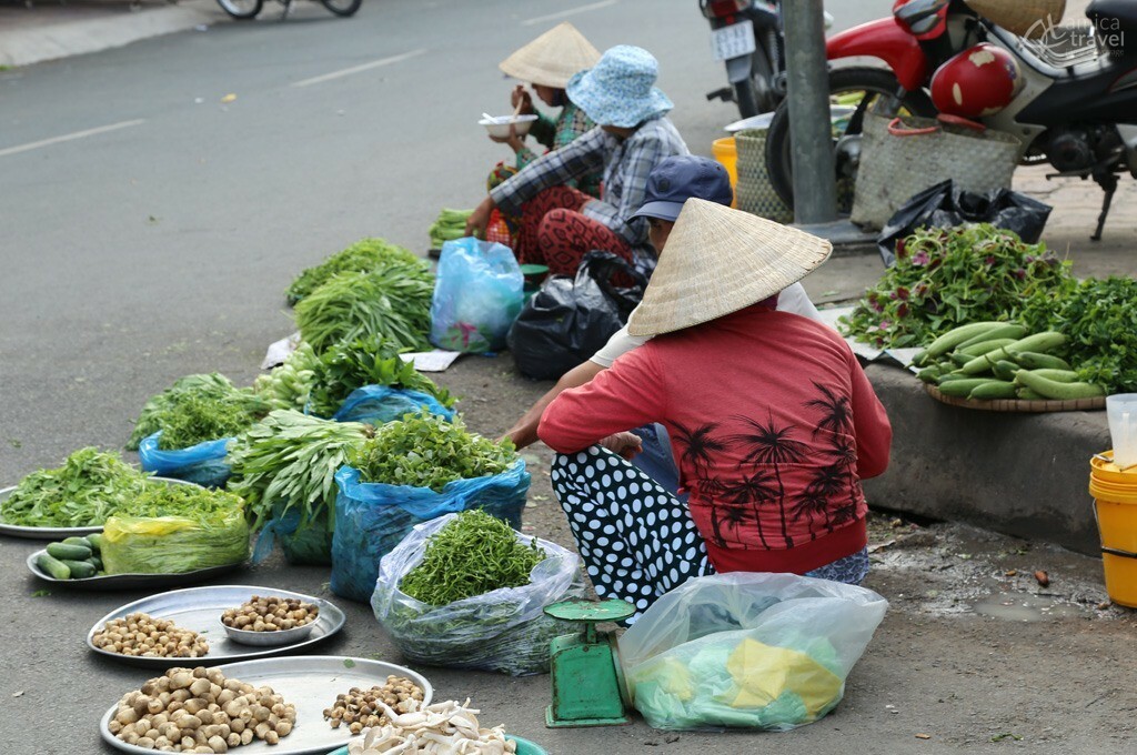 Vendeuse de légumes à Go Cong Vendeuse de légumes Go Cong