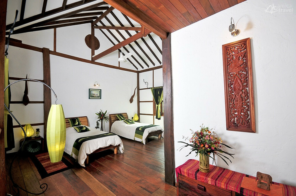 Chambre twin dans un ton vert muang la lodge chambre verte